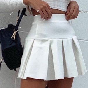 lioness white pleated skirt